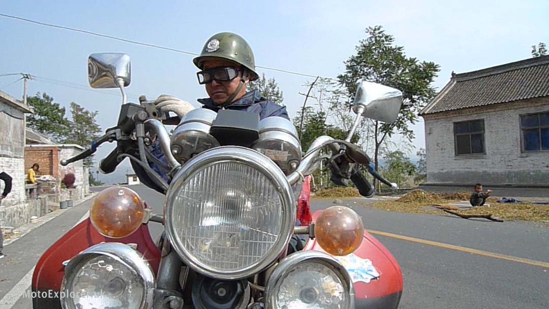 asian motorbike rider on silk road