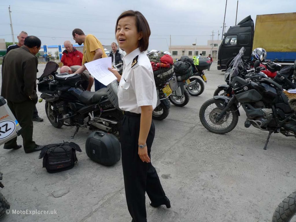 Chinese border customs checking motorcycles
